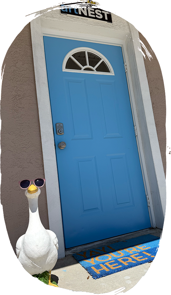 Artnest team mascot welcoming guests