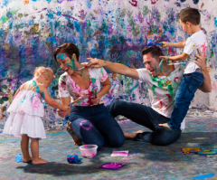 Young artist experimenting with paint at Artnest Studio